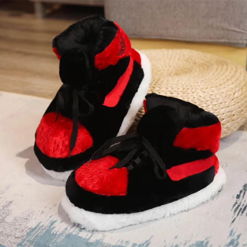 Cozy basketball sneaker-themed slippers in red, black, and white colors, designed for maximum comfort.