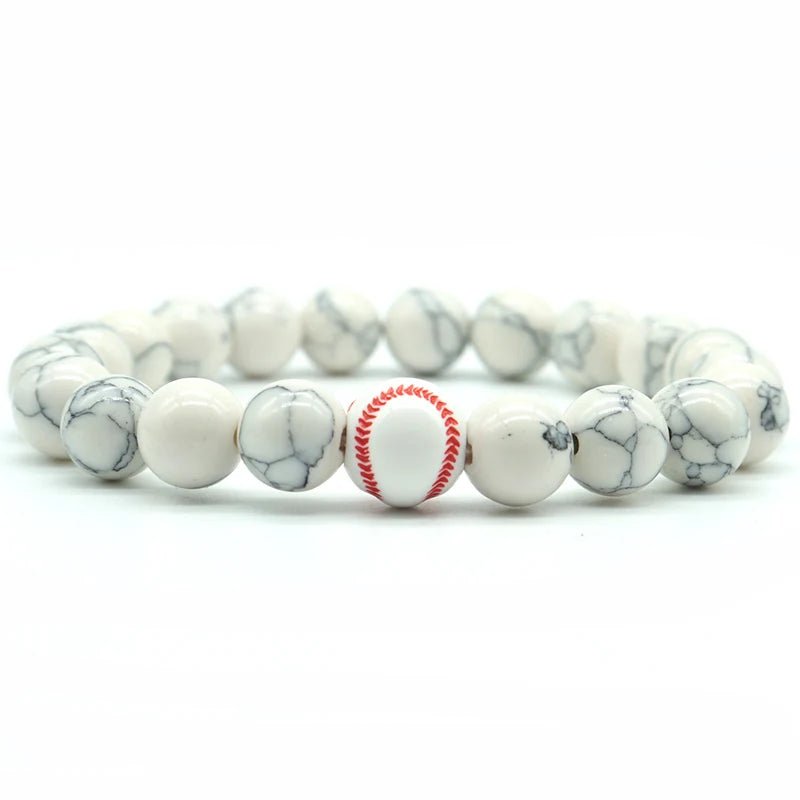 white beaded bracelet featuring a central basketball bead, perfect for sports fans and athletes looking for a stylish accessory.