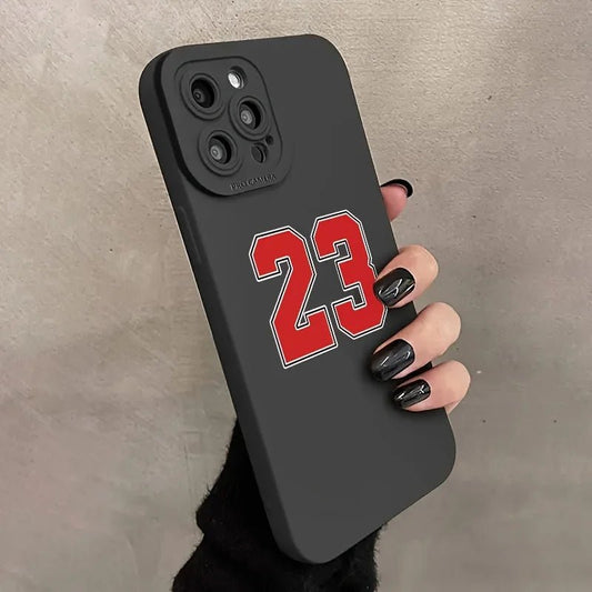 Premium black iPhone case featuring the iconic number 23 in bold red and white outline, perfect for basketball enthusiasts and fans of legendary players. The sleek matte finish provides a firm grip, while the precise camera cutout maintains full functionality. Ideal for protecting your smartphone while showcasing your sports passion with a stylish and durable design.