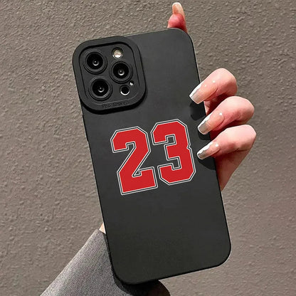 Premium black iPhone case featuring the iconic number 23 in bold red and white outline, perfect for basketball enthusiasts and fans of legendary players. The sleek matte finish provides a firm grip, while the precise camera cutout maintains full functionality. Ideal for protecting your smartphone while showcasing your sports passion with a stylish and durable design.