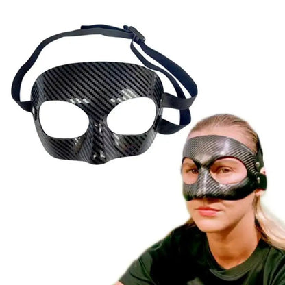 Carbon fiber basketball face protection mask with adjustable straps, designed to prevent injuries during intense sports activities.