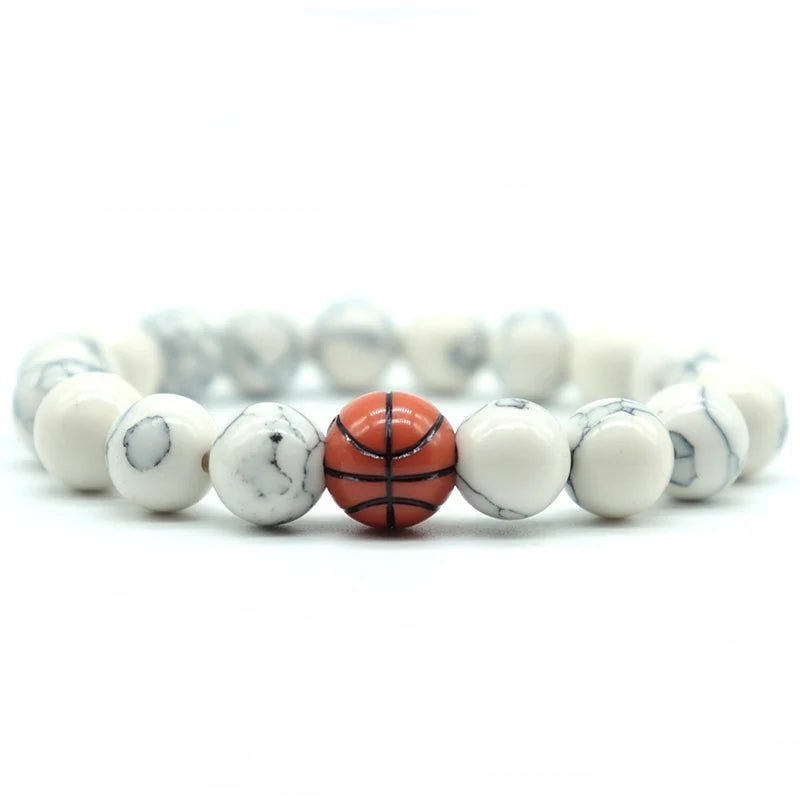 white beaded bracelet featuring a central basketball bead, perfect for sports fans and athletes looking for a stylish accessory.